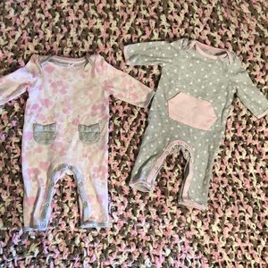 Two 2 piece girl’s body suits.